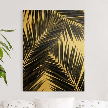 Canvas schilderijen - Goud View Through Palm Leaves Black And White