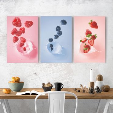 Canvas schilderijen - 3-delig Colourful fruits milk splash