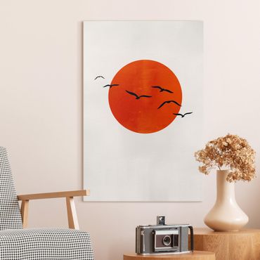 Canvas schilderijen Flock Of Birds In Front Of Red Sun I