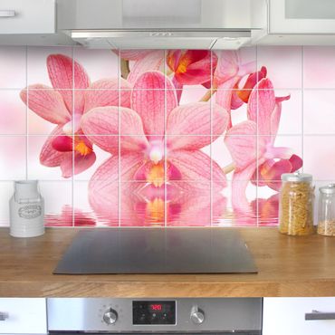 Tegelstickers Tile Mural Pink orchids on water