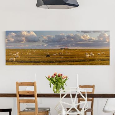 Canvas schilderijen North Sea Lighthouse With Flock Of Sheep
