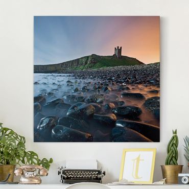 Canvas schilderijen Sunrise With Fog At Dunstanburgh Castle
