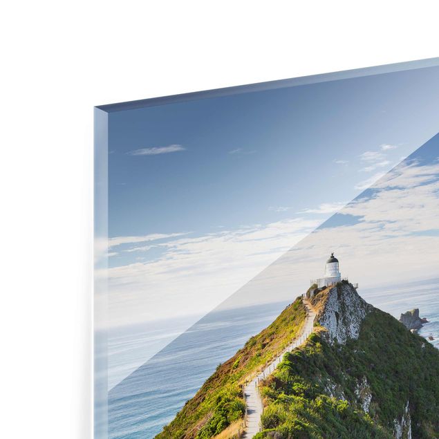 Glasschilderijen Nugget Point Lighthouse And Sea New Zealand