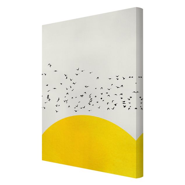 Canvas schilderijen Flock Of Birds In Front Of Yellow Sun