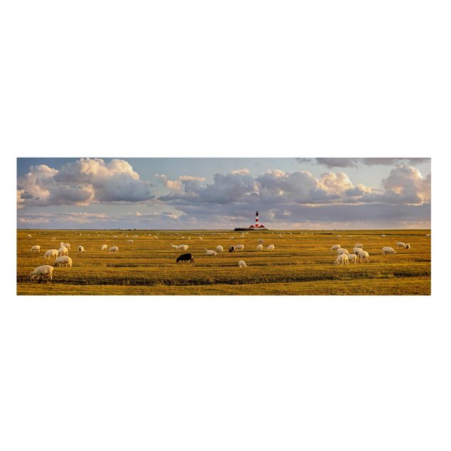 Canvas schilderijen North Sea Lighthouse With Flock Of Sheep