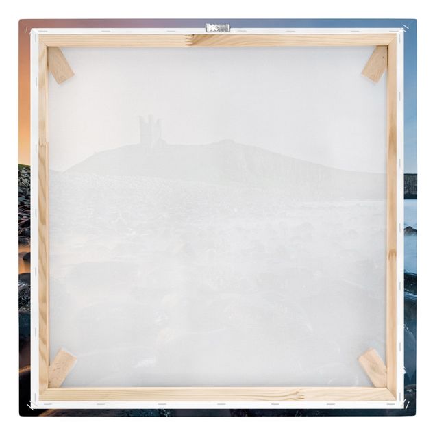 Canvas schilderijen Sunrise With Fog At Dunstanburgh Castle