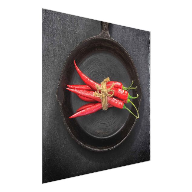 Glasschilderijen Red Chili Bundles In Pan On Slate