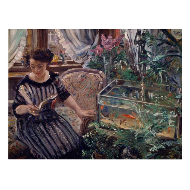 Canvas schilderijen Lovis Corinth - A Woman Reading Near A Goldfish Tank