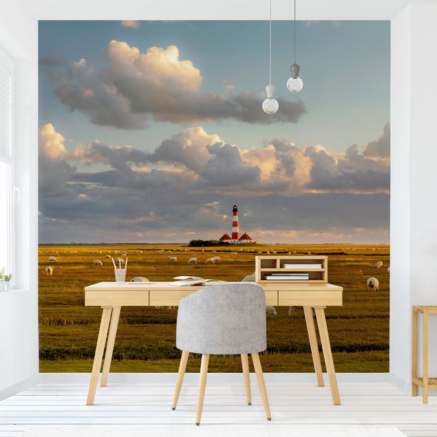 Fotobehang North Sea Lighthouse With Flock Of Sheep