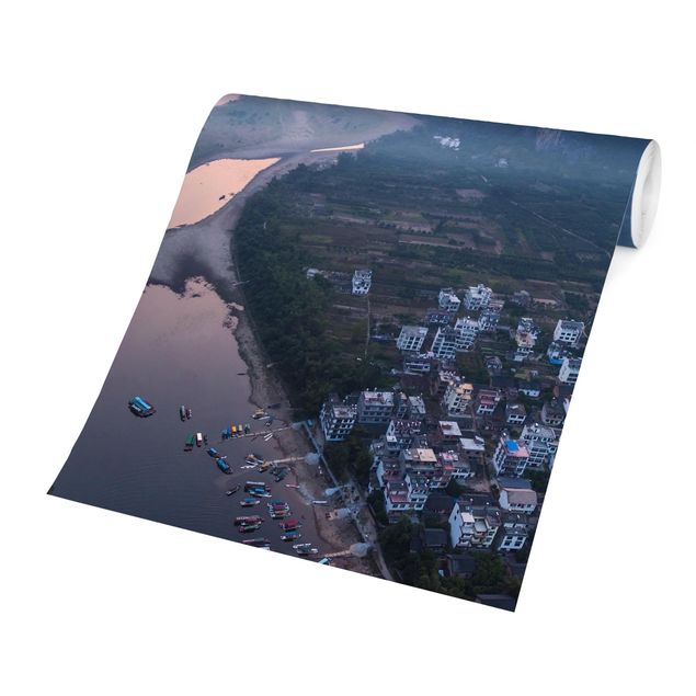 Fotobehang City At A river