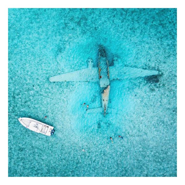 Glasschilderijen Top View Airplane Wreckage In The Ocean