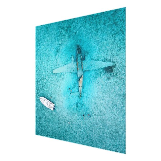 Glasschilderijen Top View Airplane Wreckage In The Ocean