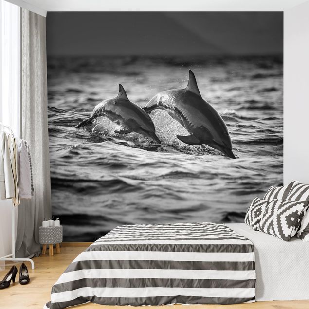Fotobehang Two Jumping Dolphins