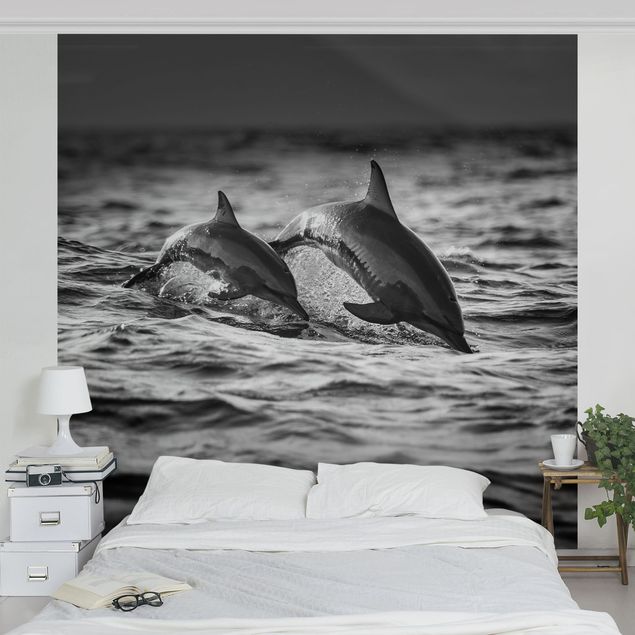 Fotobehang Two Jumping Dolphins