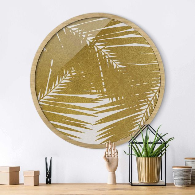 Runde Bilder mit Rahmen View Through Golden Palm Leaves