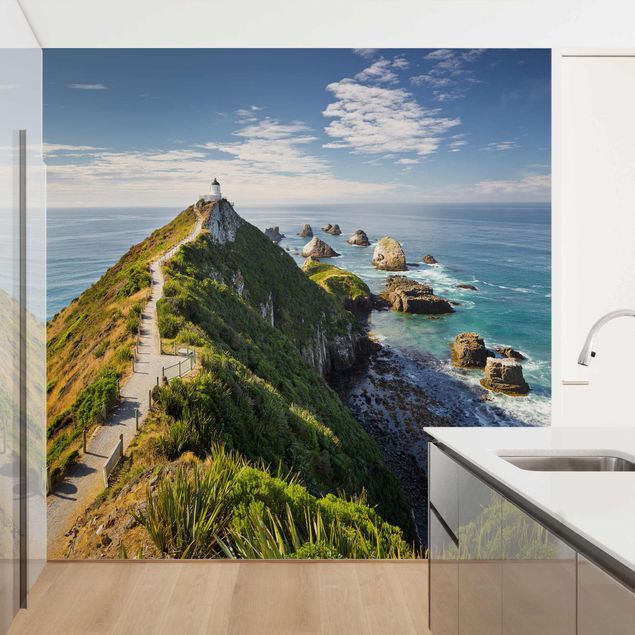 Fotobehang Nugget Point Lighthouse And Sea New Zealand