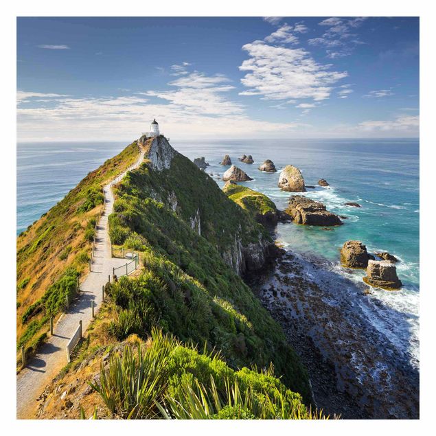 Fotobehang Nugget Point Lighthouse And Sea New Zealand