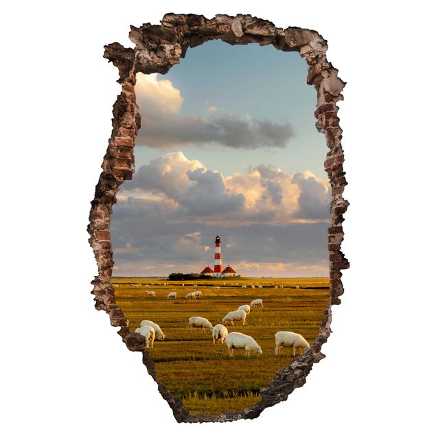 Muurstickers dieren North Sea Lighthouse With Flock Of Sheep